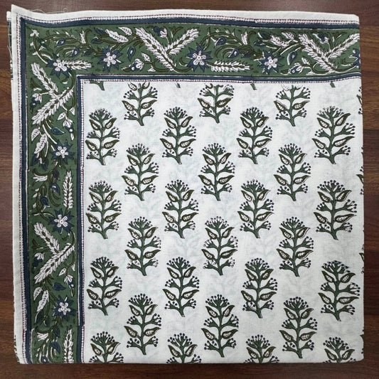 Fabric with floral pattern on a wooden surface