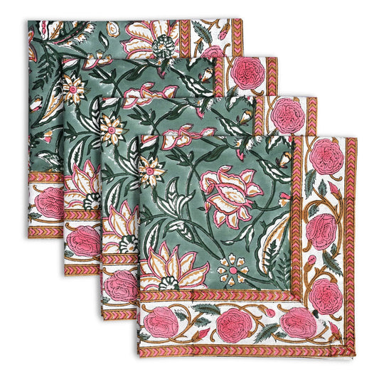 Set of floral patterned napkins with pink and green colors on a white background