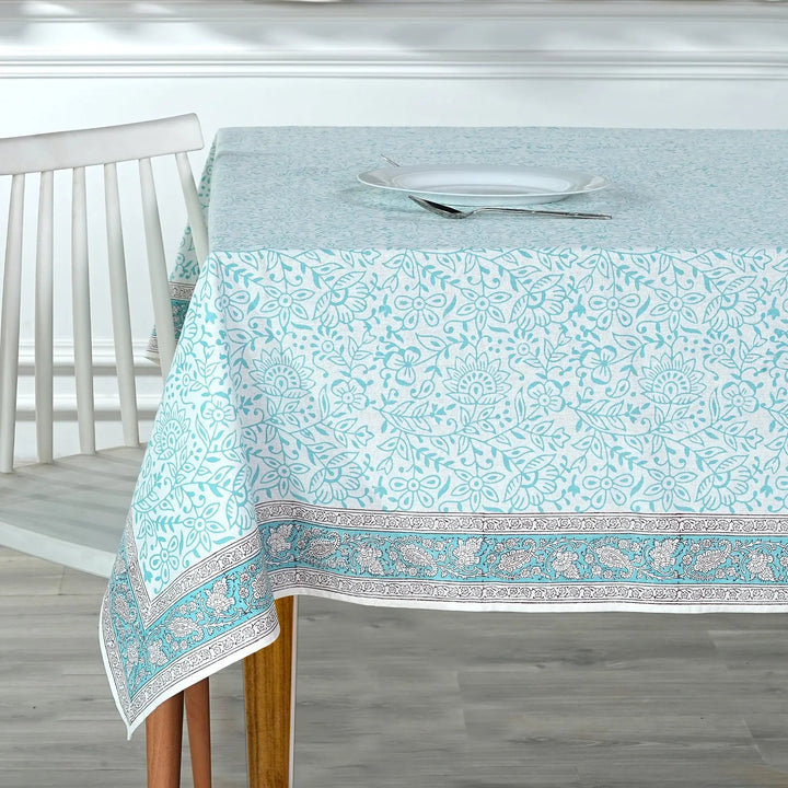 Tablecloth with a floral pattern on a wooden table