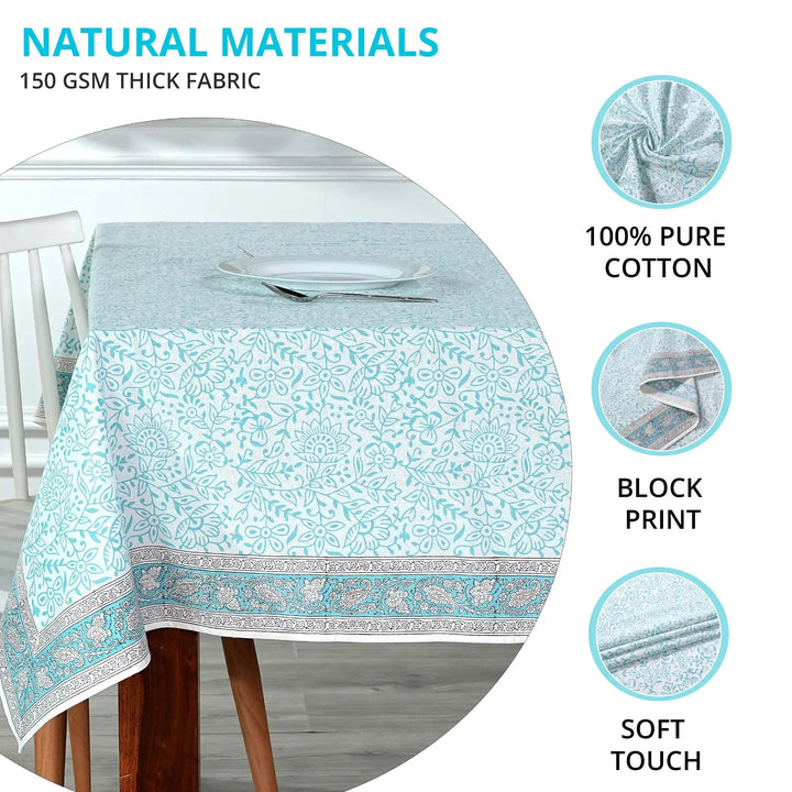Tablecloth with floral pattern on a table, featuring text about natural materials and fabric properties.