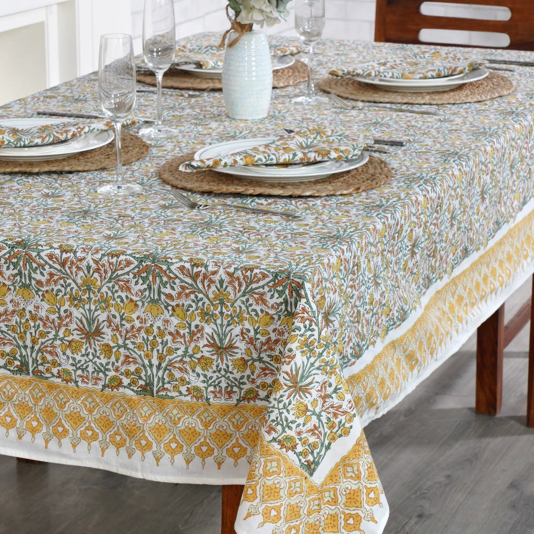 Decorative tablecloth with floral pattern on a dining table