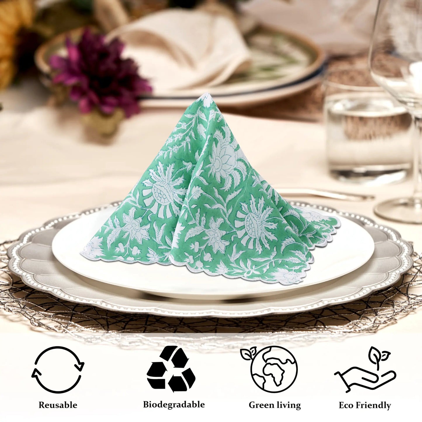 Green and white patterned napkin on a plate with table setting and eco-friendly icons.