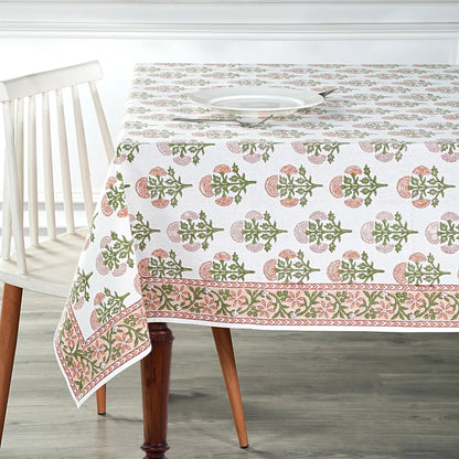 Tablecloth with floral pattern on a wooden table and chair