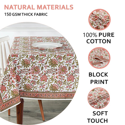 Floral patterned tablecloth on a table with text highlighting natural materials and fabric details.