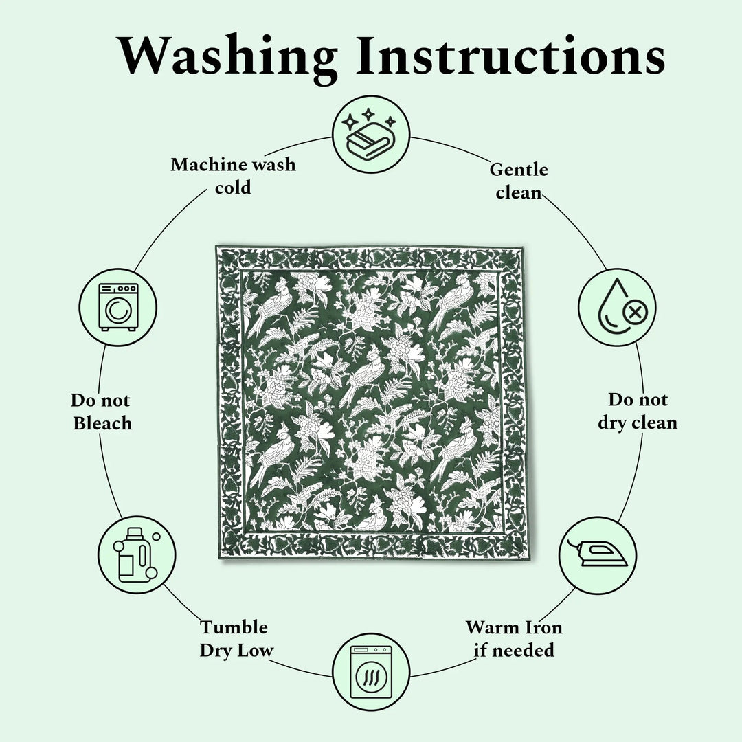 Washing instructions for a fabric product with icons and text on a light green background.