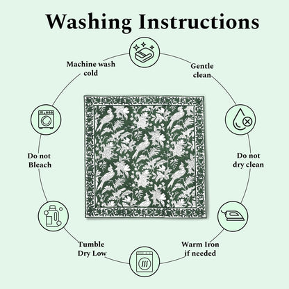 Washing instructions for a fabric product with icons and text on a light green background.