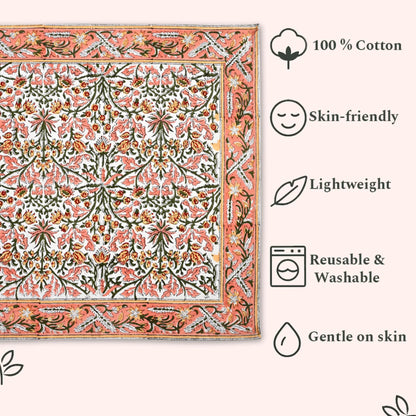 Floral patterned fabric with sustainability and care instructions on a white background