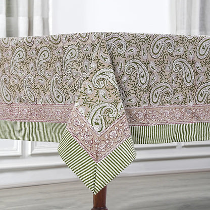 Patterned tablecloth with paisley design on a white surface