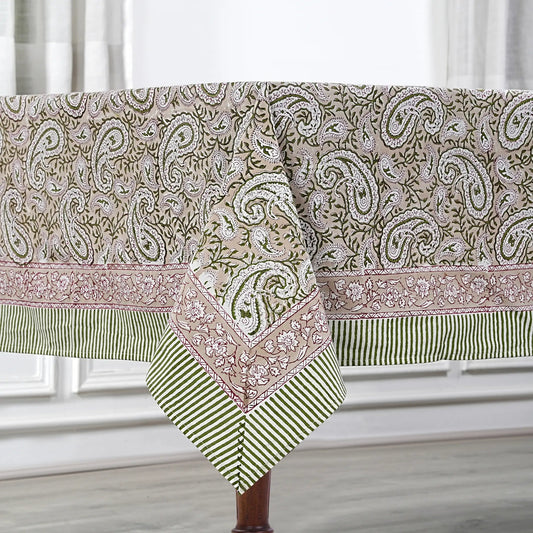 Patterned tablecloth with paisley design on a white surface