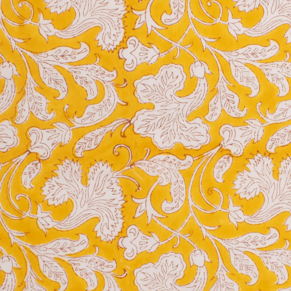 Patterned fabric with white floral design on a yellow background