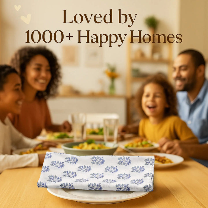 Family enjoying a meal together with a decorative napkin on a table.