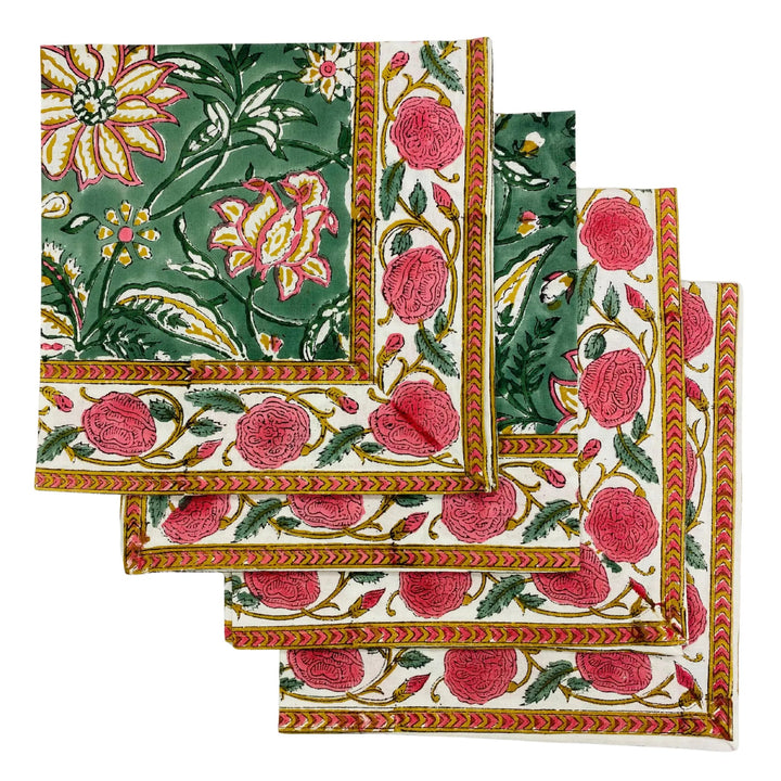 Set of floral patterned napkins with green, pink, and gold colors on a white background.