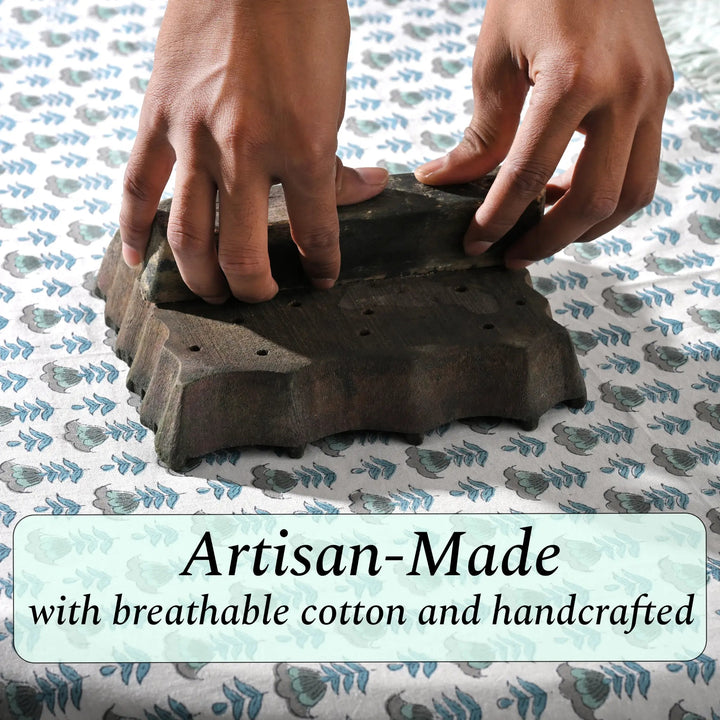 Hands holding a handmade stone product with text &
