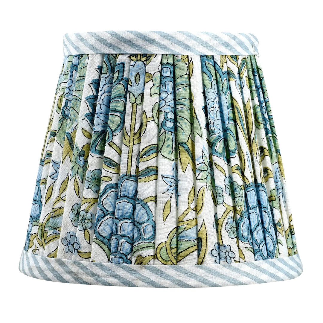 Skirt with floral pattern and striped hem on a white background