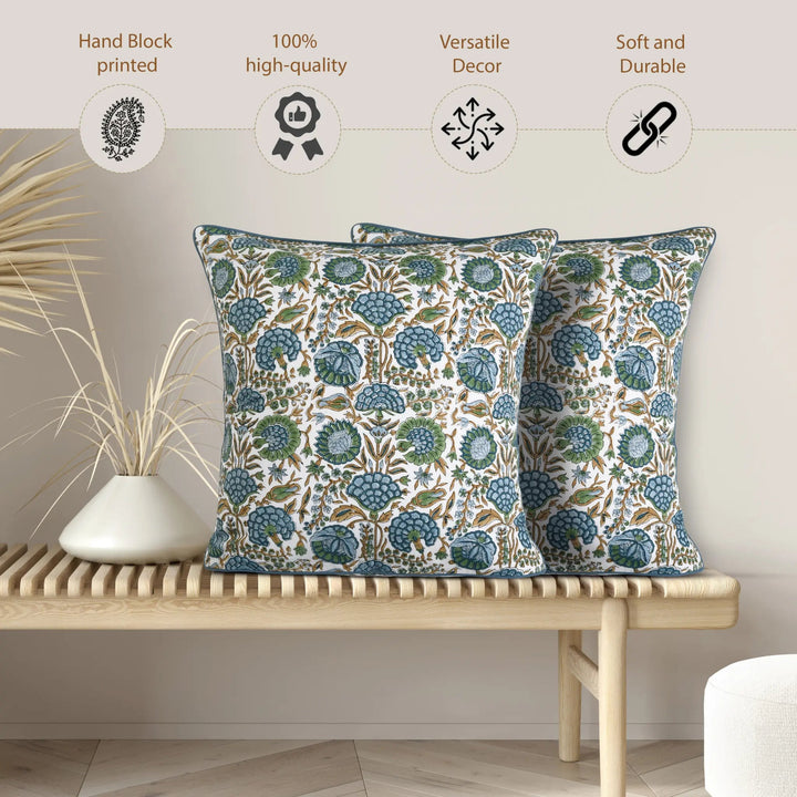 Decorative pillows with floral pattern on a wooden bench, featuring quality and design attributes.