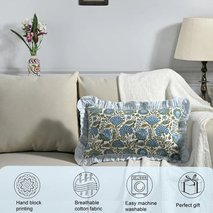 Decorative pillow with floral pattern on a sofa in a living room setting