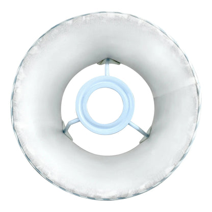 Round inflatable ring with a central blue light on a white background