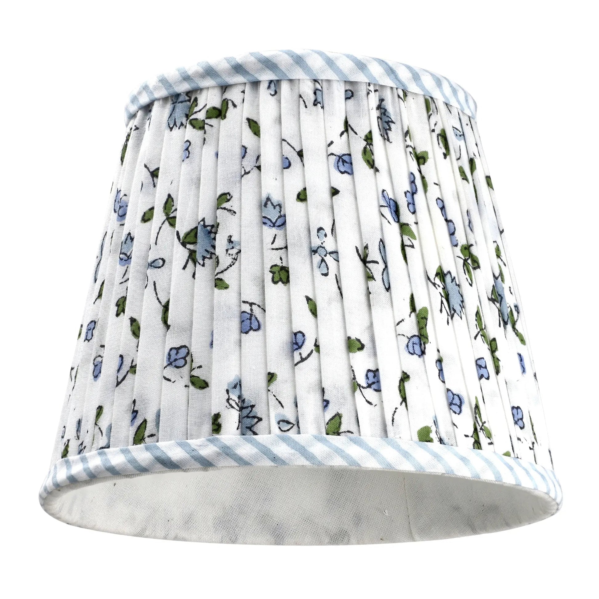 Floral patterned lampshade with striped trim on a white background