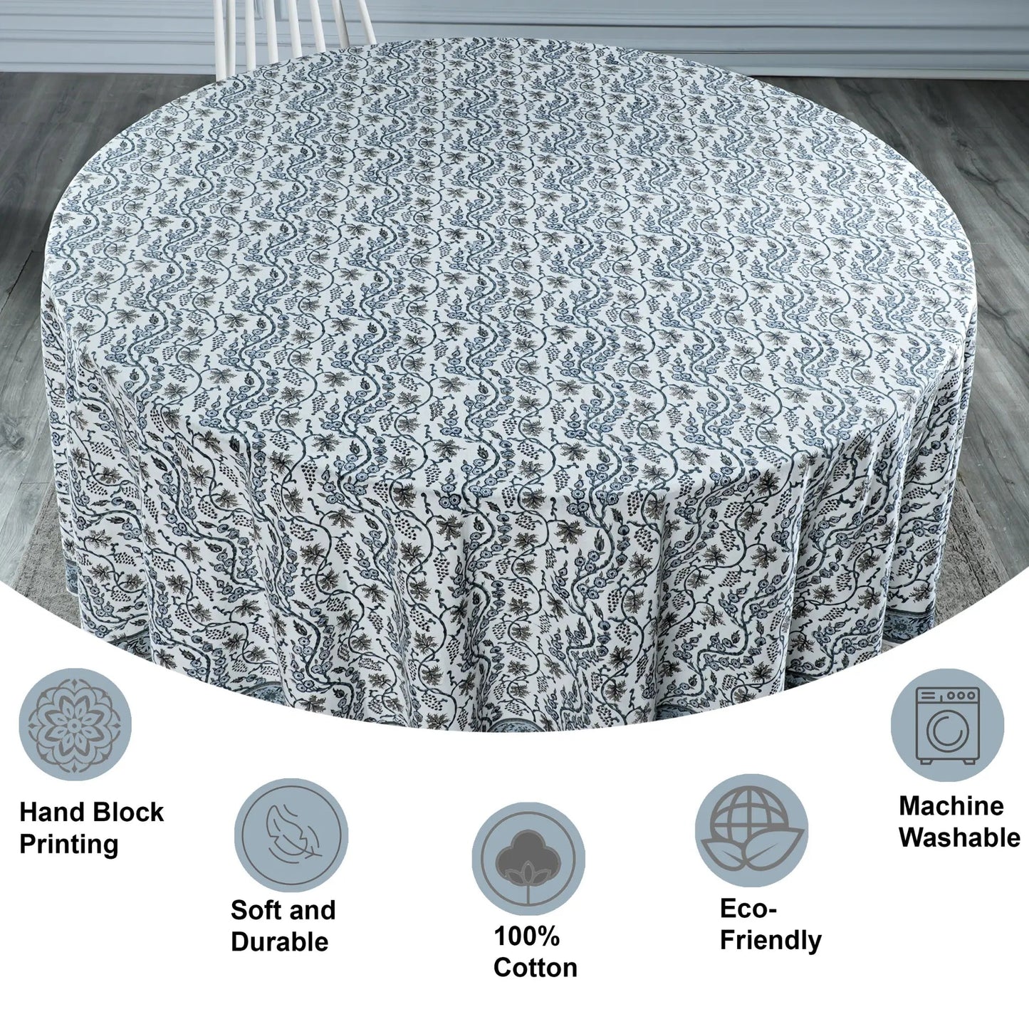 Round table with a patterned tablecloth on a wooden floor, with features highlighted below.