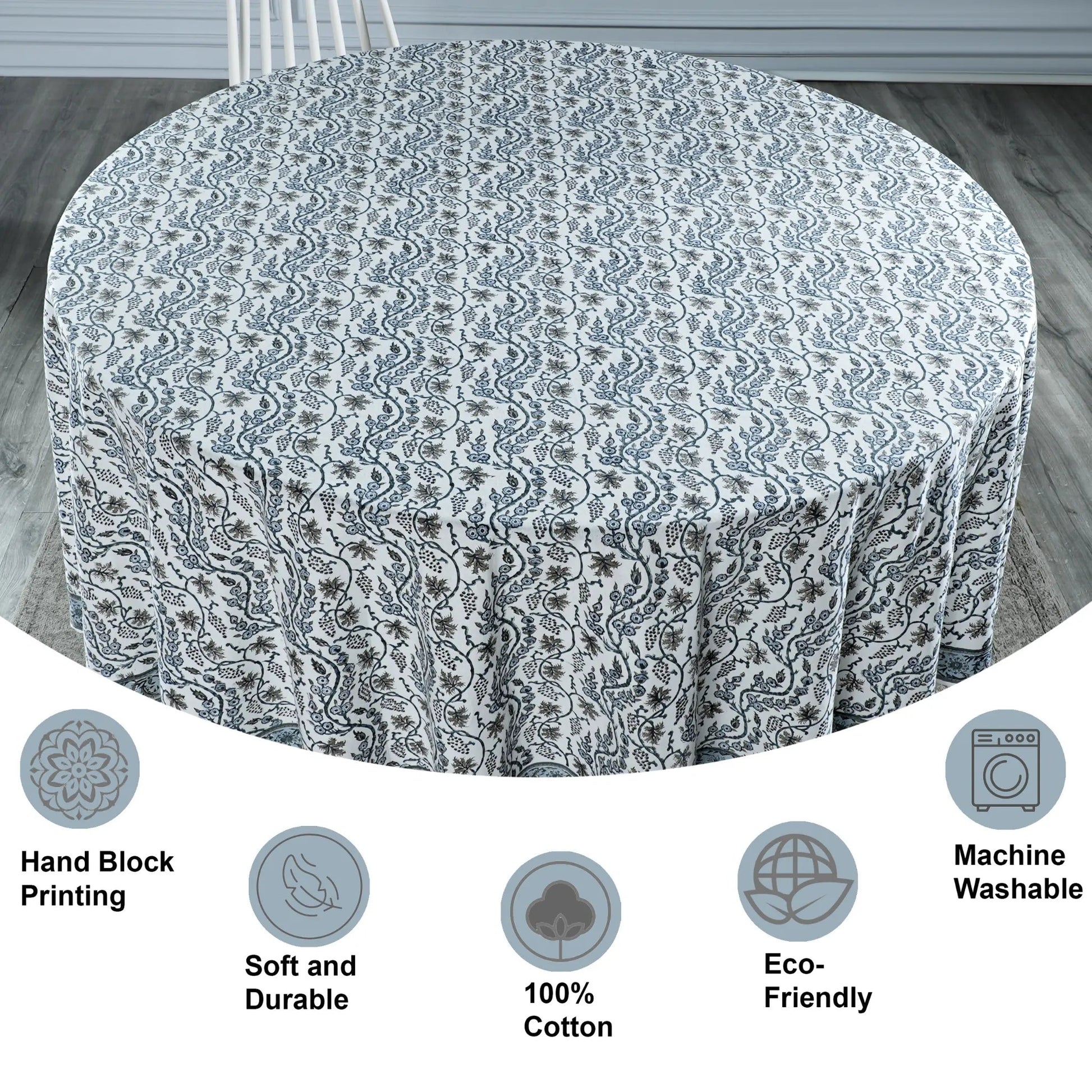 Round table with a patterned tablecloth on a wooden floor, with features highlighted below.