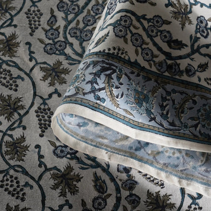 Close-up of a patterned fabric with intricate designs.