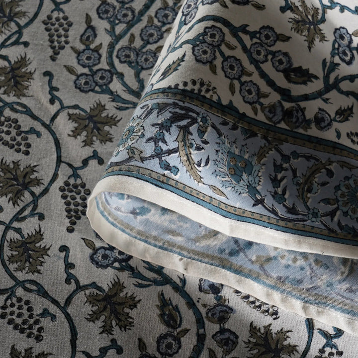 Close-up of a patterned fabric with intricate designs.