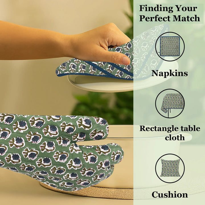 Patterned tablecloth, napkins, and cushion on a neutral background with text &