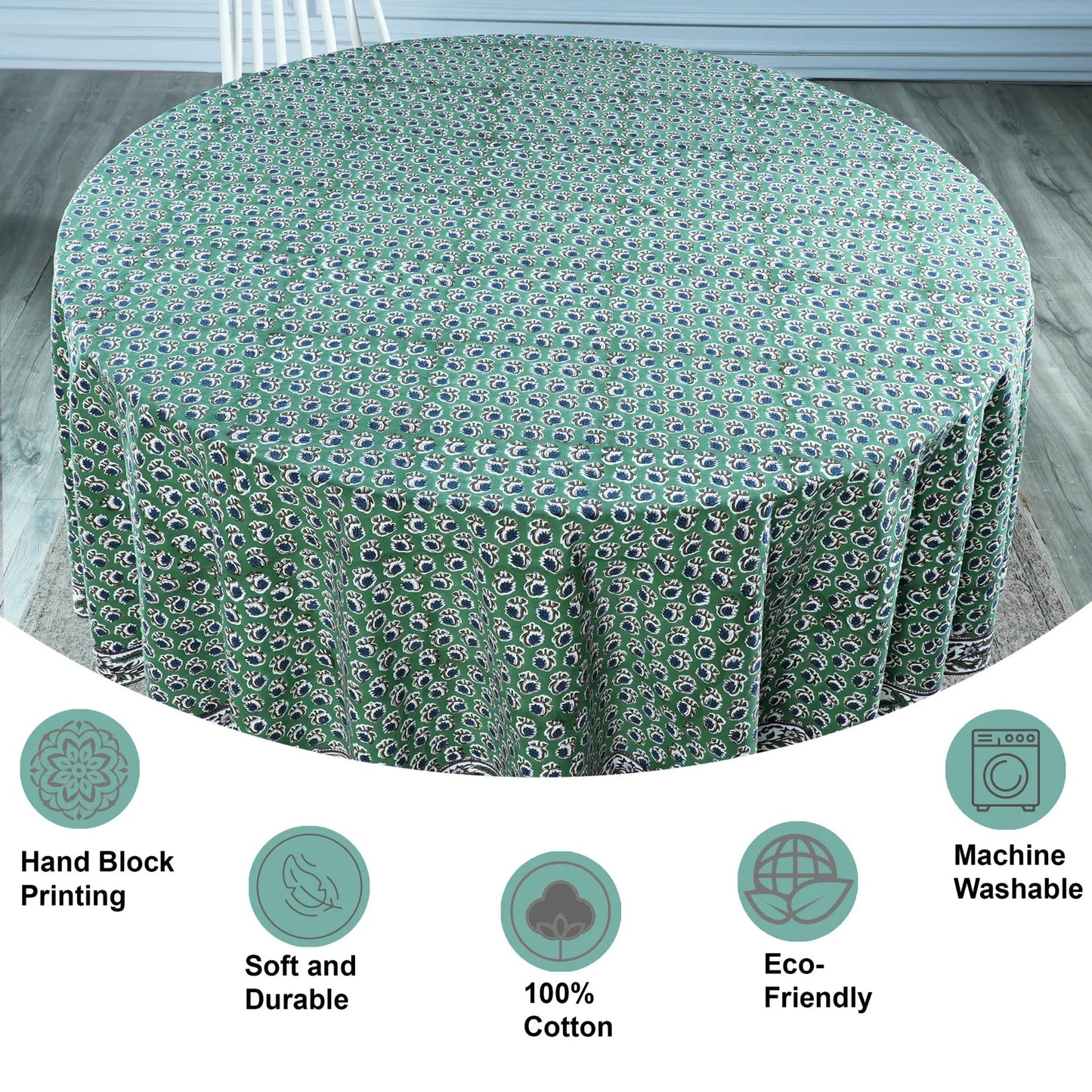 Green patterned tablecloth on a round table with features highlighted.