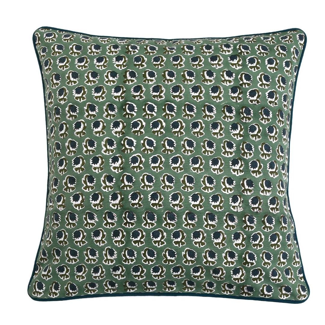 Decorative pillow with a pattern on a green background