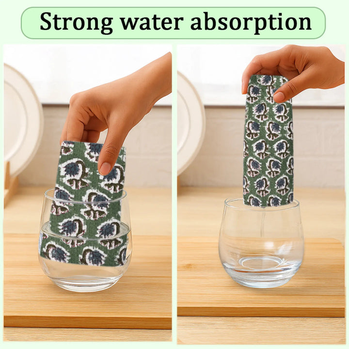 Hand holding a patterned dish cloth over a glass with text &