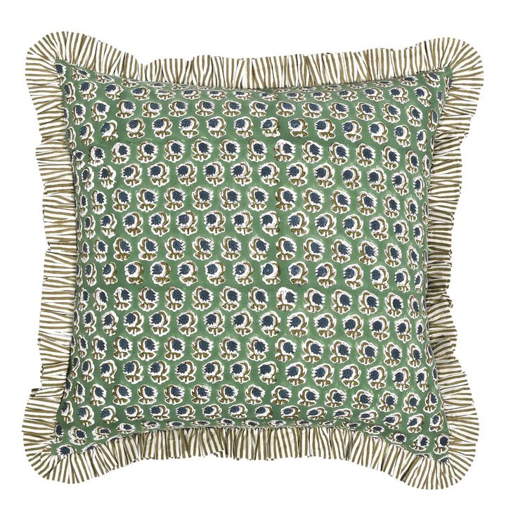 Decorative pillow with a green patterned cover and ruffled edge on a white background