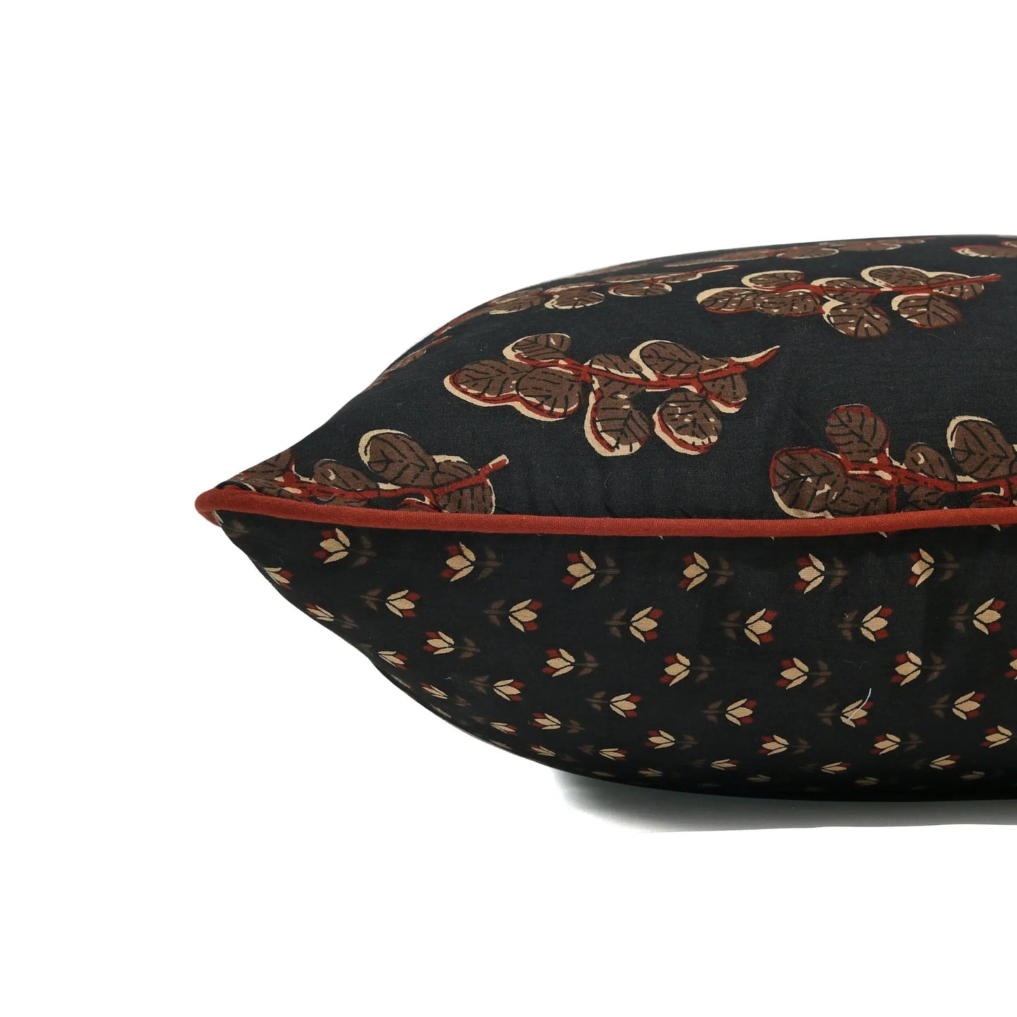 Decorative pillow with intricate patterns on a white background