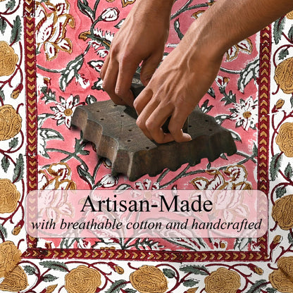 Person using a stamp on a floral-patterned fabric with 'Artisan-Made' text overlay.