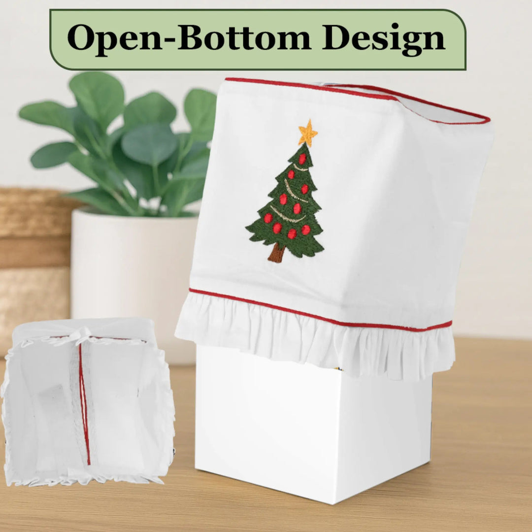 Towel with Christmas tree design and open-bottom design text above it.