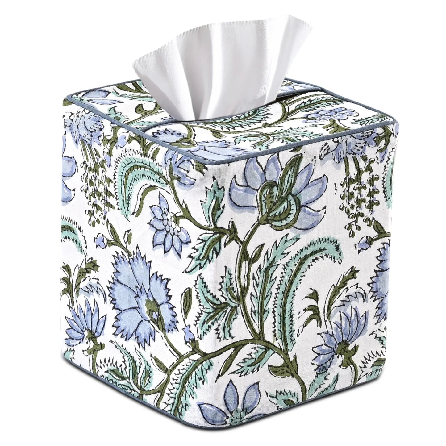 Floral-patterned tissue box cover with white tissues on a white background