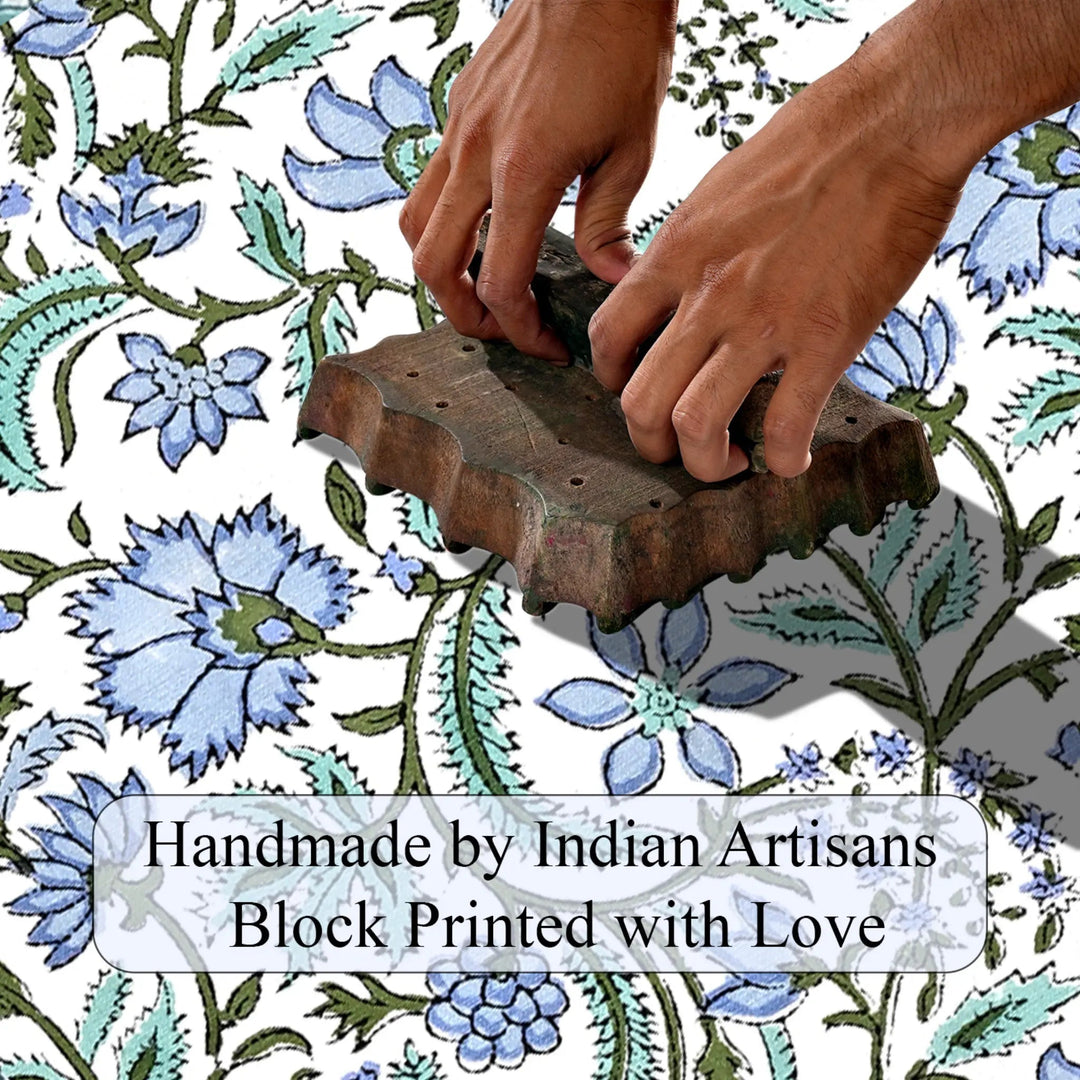 Hand block printing fabric with floral patterns and text &