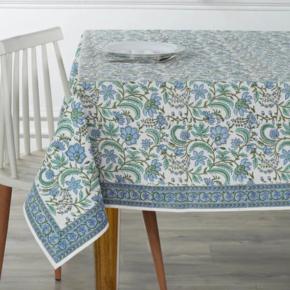 Tablecloth with floral pattern on a wooden table and chair