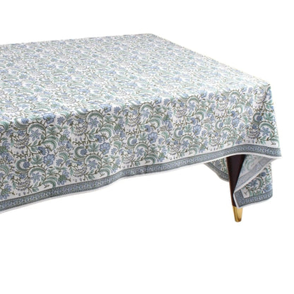 Tablecloth with floral pattern on a wooden table