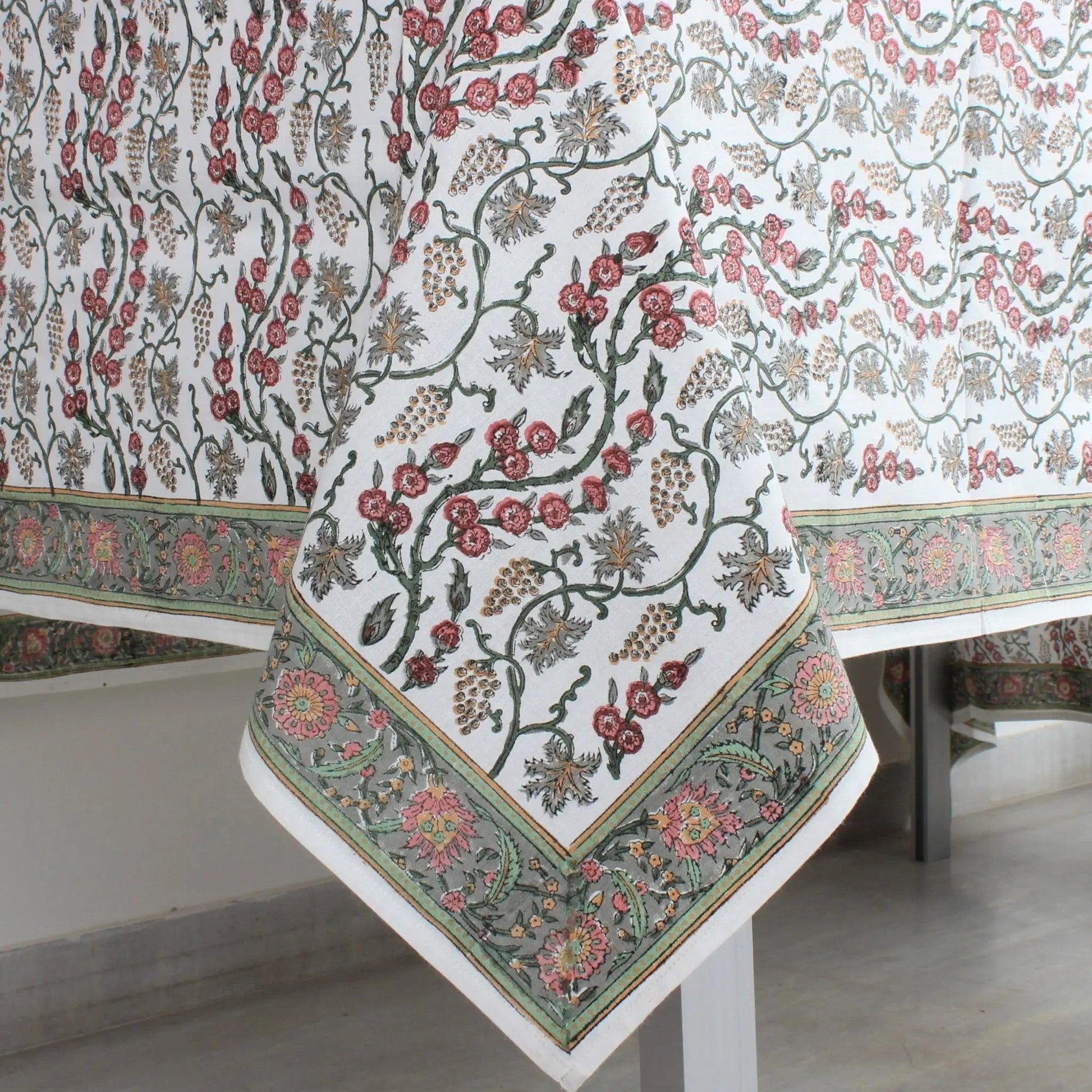 Floral patterned tablecloth on a white table