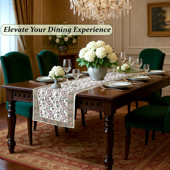 Dining room with a set table, floral arrangements, and a chandelier.