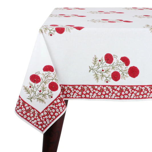 Decorative tablecloth with red floral patterns on a white background