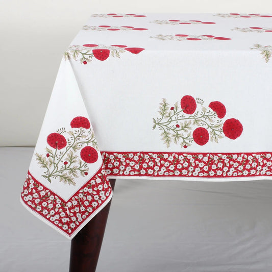 Decorative tablecloth with floral and berry pattern on a white background