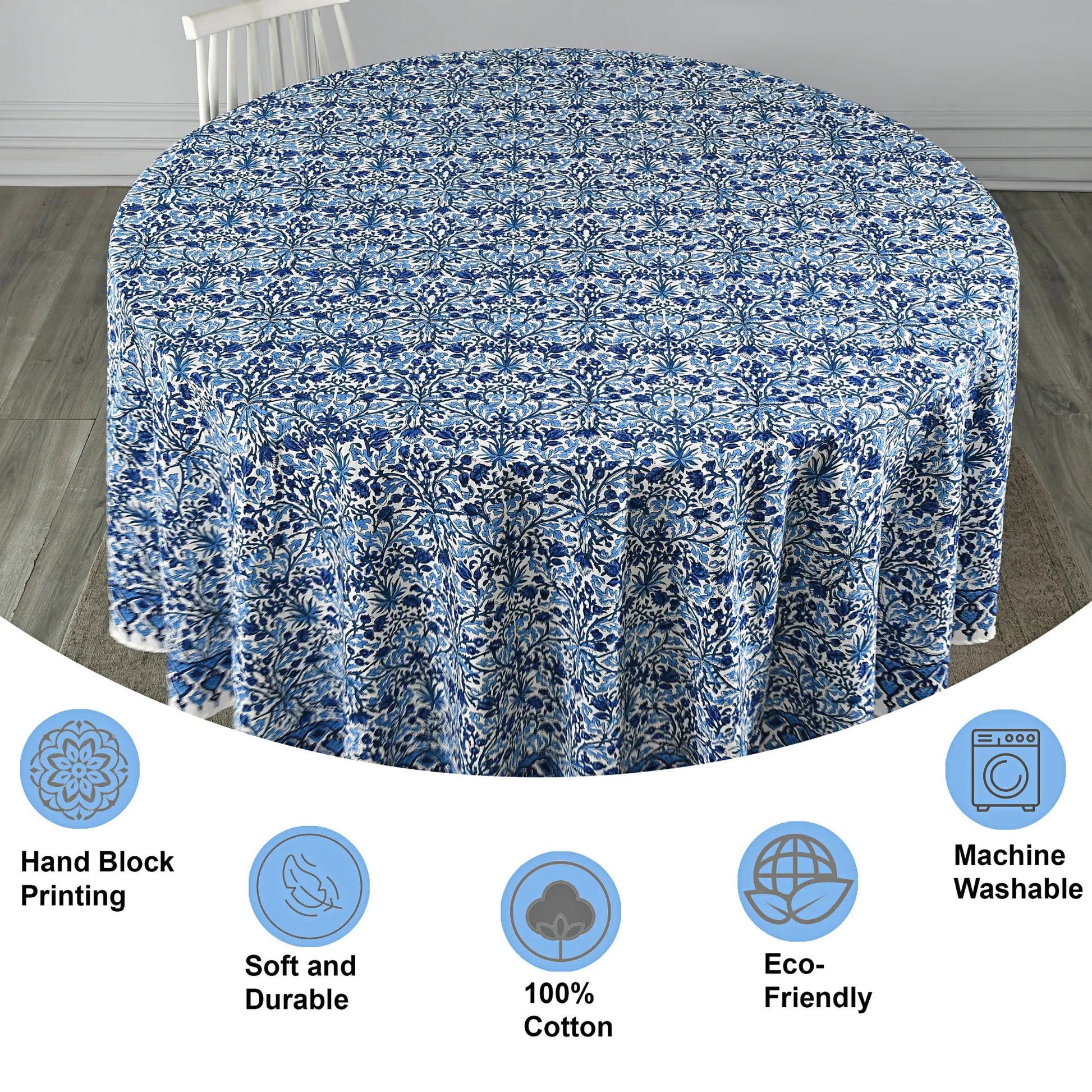 Round tablecloth with blue floral pattern on a wooden floor, featuring icons and text about product features.