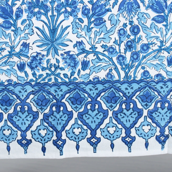 Blue floral and geometric pattern on a white background