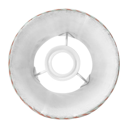 Round metal ring with a central hole on a white background