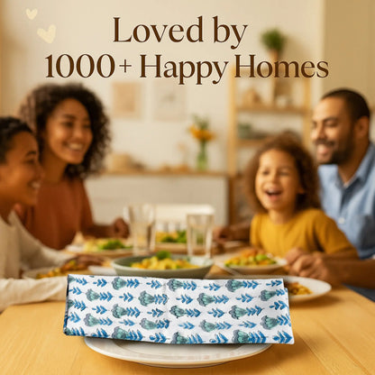 Family enjoying a meal together with a decorative napkin on a table, text 'Loved by 1000+ Happy Homes' above.