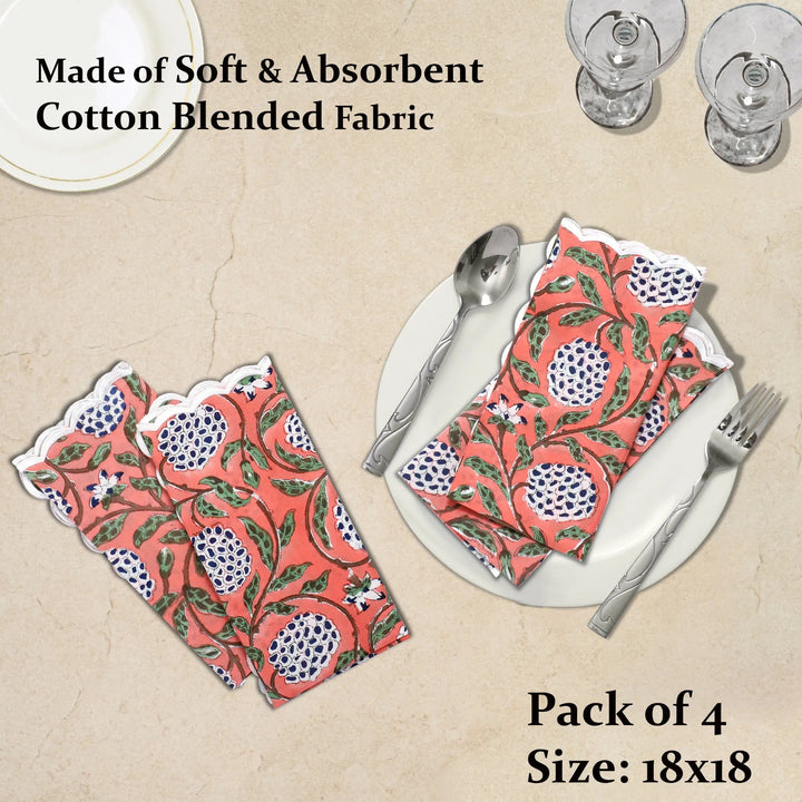 Pack of 4 patterned napkins on a table setting with cutlery, on a beige background.