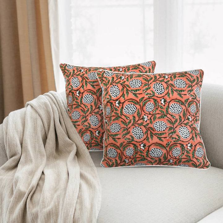 Decorative pillows with floral pattern on a sofa