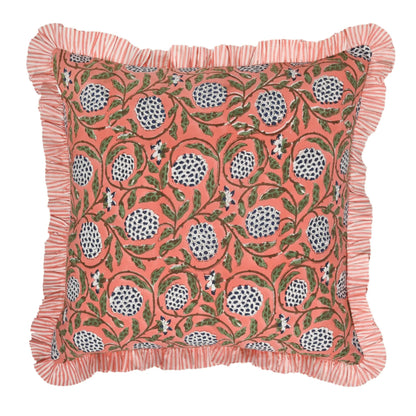 Decorative pillow with pomegranate pattern on a white background