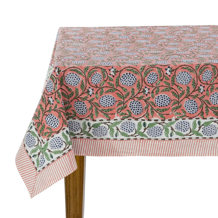 Decorative tablecloth with floral pattern on a white background